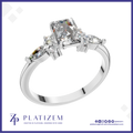 Emerald Cut Diamond Ring with Marquise and Round Cluster Side Stones