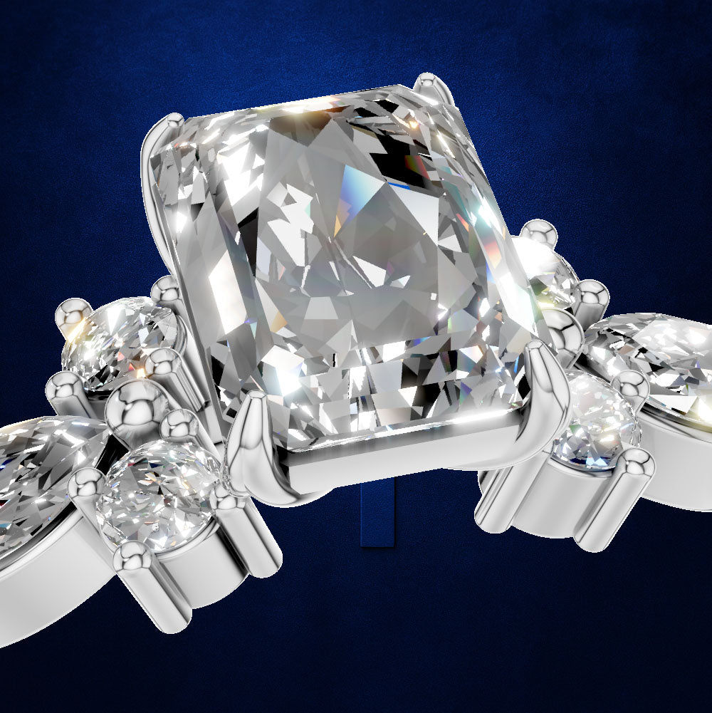 Emerald Cut Diamond Ring with Marquise and Round Cluster Side Stones