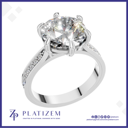 Round Cut Diamond Solitaire Ring Held by a Six Prong Cathedral Setting