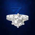 Round Cut Diamond Solitaire Ring Held by a Six Prong Cathedral Setting