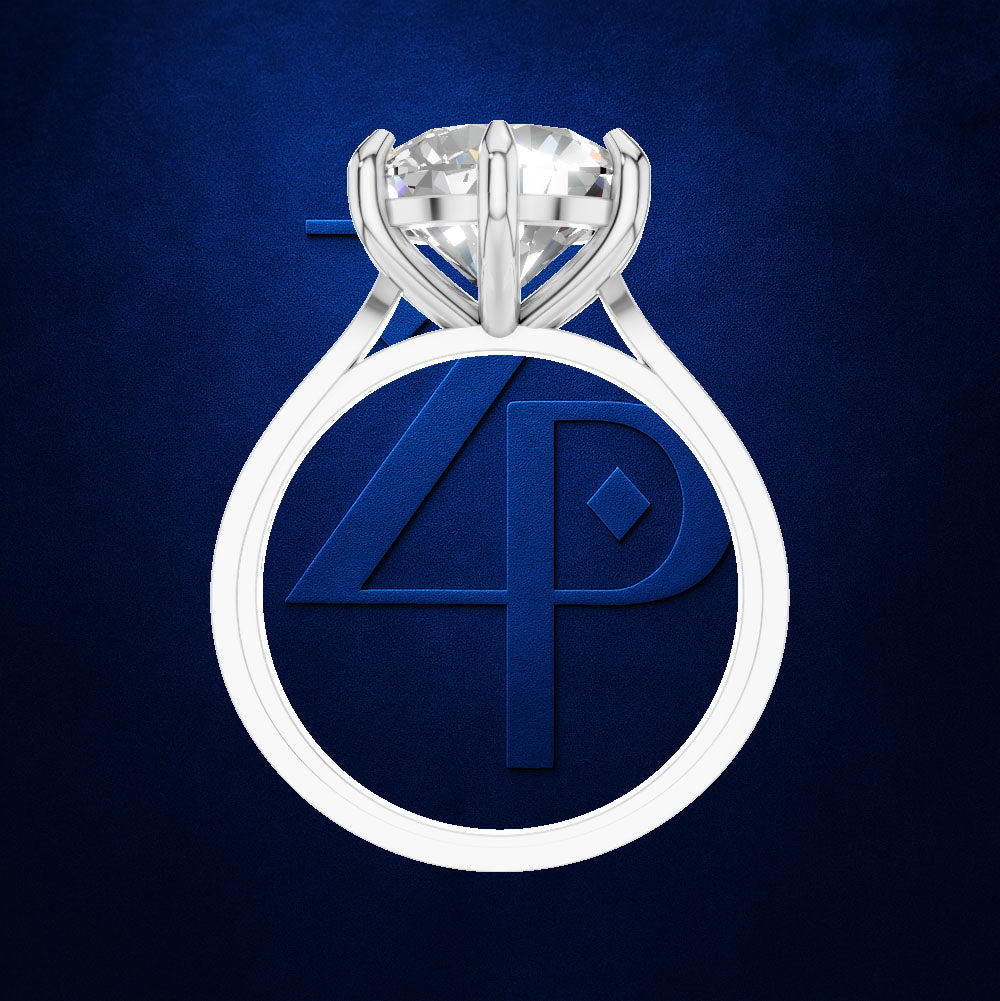 Round Cut Diamond Solitaire Ring Held by a Six Prong Cathedral Setting