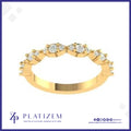 A yellow gold diamond ring with a curved row of round-cut diamonds, presented on a white background with the brand logo 'Platizem' at the bottom.