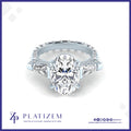 Oval Diamond Ring with Baguette Accents and Pave Band