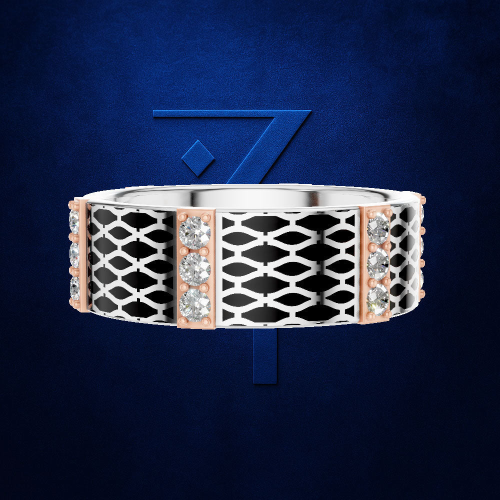 A wide silver ring with a geometric openwork pattern, black inlay, rose gold side panels, and clear gemstones, shown against a dark blue textured background with a blue stylized '7' behind it.