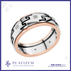 A platinum and rose gold ring with black Greek key patterns and small clear stones, shown on a white background with the brand logo 'PLATIZEM' at the bottom.