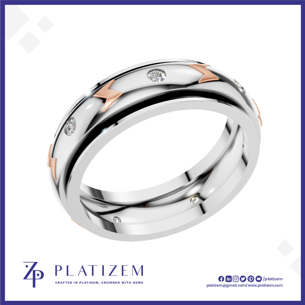 A polished two-tone wedding band ring by Platiszem, featuring a silver-toned main body, rose gold chevron accents, and small clear pavé-set diamonds. The ring is displayed on a white background with a blue border, and the Platiszem brand logo is visible at the bottom.