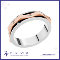 A modern platinum and rose gold ring with small clear gemstones, shown on a white background with the Platizem brand logo at the bottom.