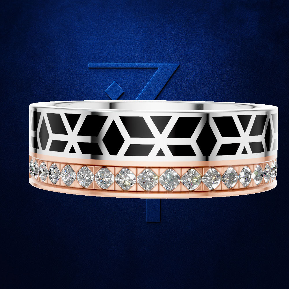 A wide geometric ring featuring a silver-toned top half with black inlay and white X-shaped lines, a rose gold bottom half with a row of clear gemstones, set against a dark blue textured background with a blue geometric logo.