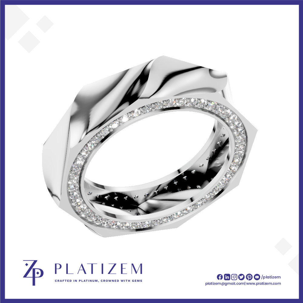 A polished silver-toned ring with a sculptural, faceted geometric design and a single row of clear pavé-set stones around the band, shown on a white background with the Platizem brand logo at the bottom.