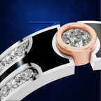 Close-up of a ring with a rose gold bezel holding a clear round gemstone, set on a white band with diamond accents against a dark blue background.