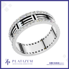 A silver-toned band ring with black trigram symbols and clear stones, shown on a white background with the Platizem brand logo at the bottom.