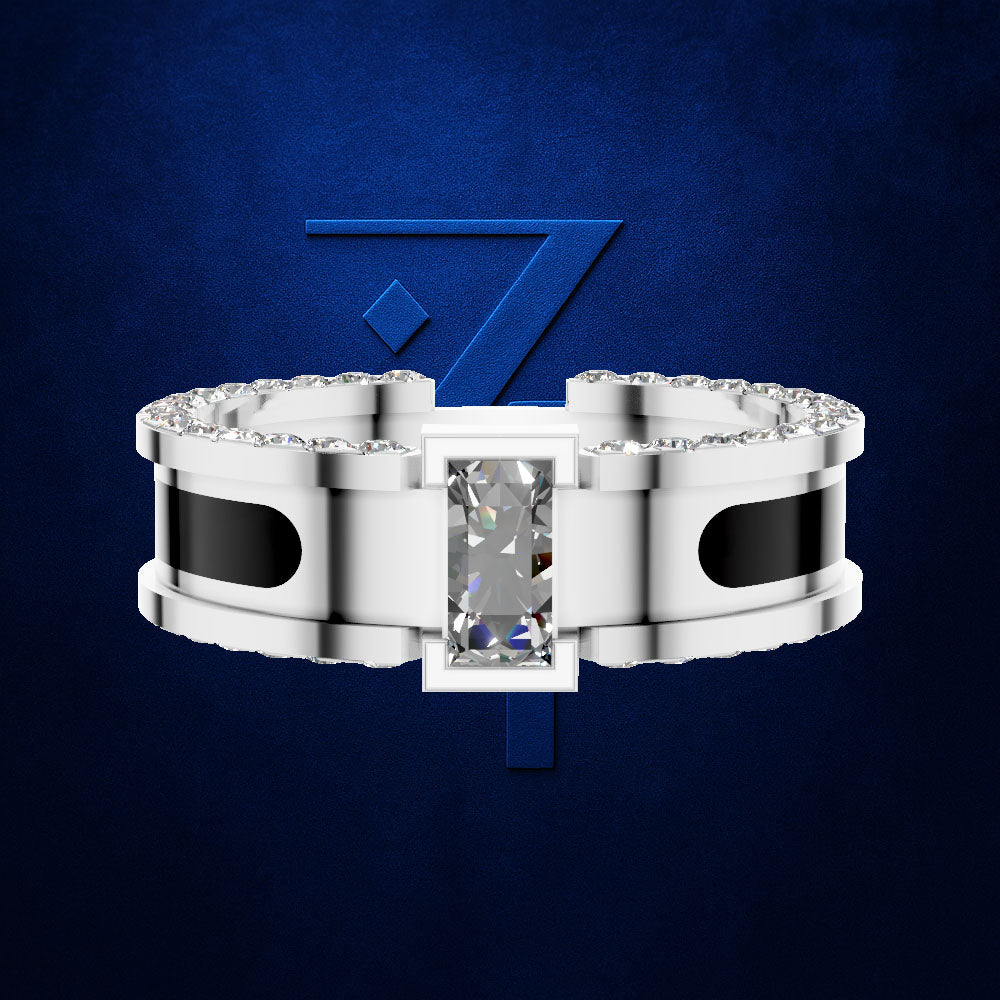 A silver-toned ring with a rectangular clear center stone and small clear stones along the shoulders, set against a dark blue textured background with a blue stylized '7' logo behind it.