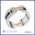 A modern two-tone diamond ring by Platiszem, featuring a silver and rose gold band with clear cubic zirconia accents, displayed on a white background with the brand logo at the bottom.