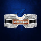 A men's geometric ring featuring a silver-toned band with black inlays, rows of clear pavé diamonds, and a rose gold center section with five round-cut diamonds, set against a dark blue textured background with a stylized blue 'Z' logo.