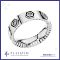 A silver-toned ring with geometric hexagonal details and small clear stones, shown on a white background with the brand name PLATIZEM at the bottom.