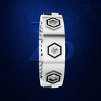 A white silicone bracelet with three hexagonal bezel settings containing clear round stones, set against a dark blue textured background with a subtle blue 'Z' logo.