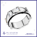 A polished silver-toned ring with a black inlay band and rectangular clear gemstones, shown on a white background with the Platizem brand logo at the bottom.