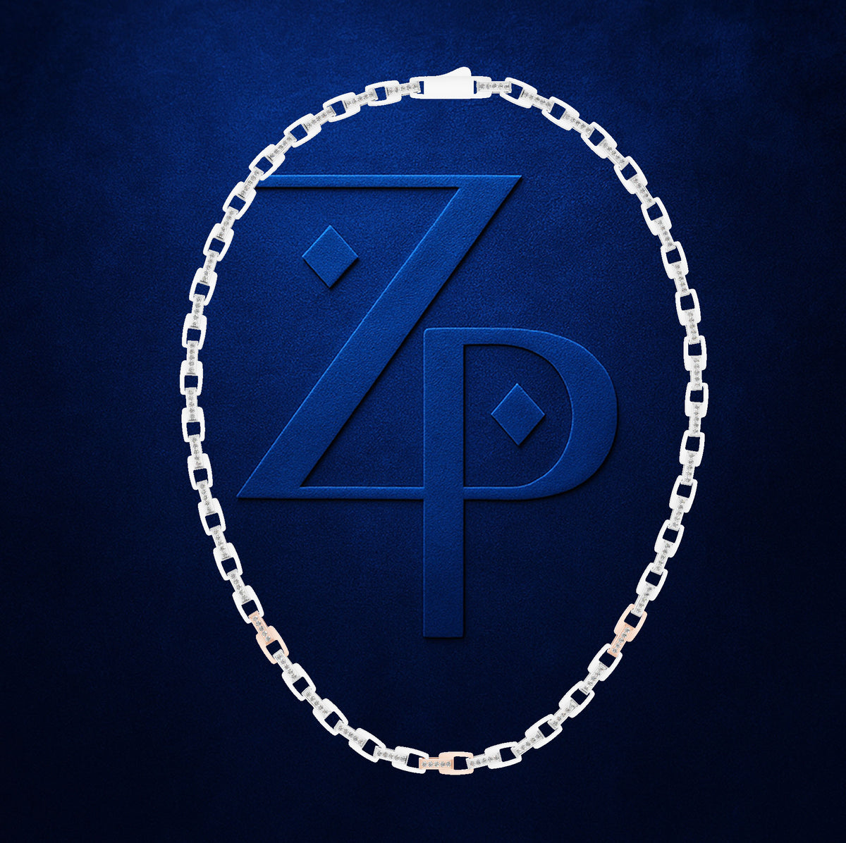 A silver chain necklace arranged in an oval around a large embossed blue 'ZP' monogram on a dark blue textured background.