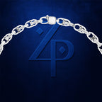 A silver chain necklace draped in an arch over a dark blue textured background, with a large embossed blue monogram logo beneath it.