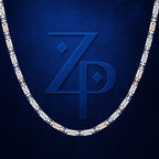 A close-up of a silver-toned chain necklace with repeating black and white geometric links, set against a textured dark blue background with a large embossed blue 'ZP' logo behind it.