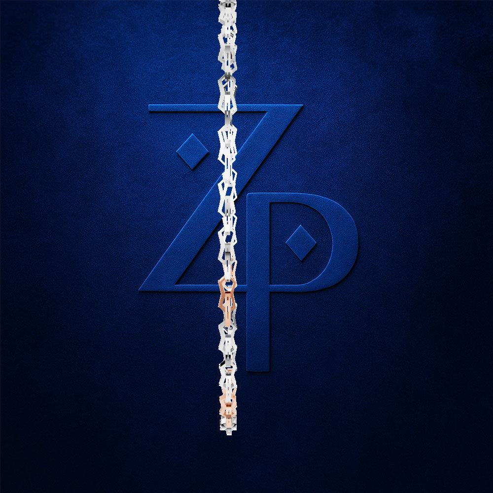 A close-up of a silver chain draped vertically over a dark blue textured background, with a large stylized blue 'ZP' monogram partially covered by the chain. A small section near the bottom shows a warm metallic copper/rose-gold tone.