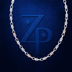 A silver-toned chain necklace with alternating square and rounded links, draped in an oval shape around a large embossed monogram logo of 'ZP' on a textured dark blue background.