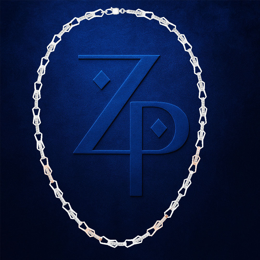 A silver-toned chain necklace arranged in an oval shape against a dark blue textured background, framing a large embossed stylized 'ZP' logo.