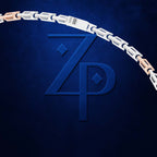 A close-up of a jewelry clasp and chain segment on a dark blue textured background, with a large embossed stylized 'ZP' logo behind it. The chain is silver-toned with rose-gold-toned accents.