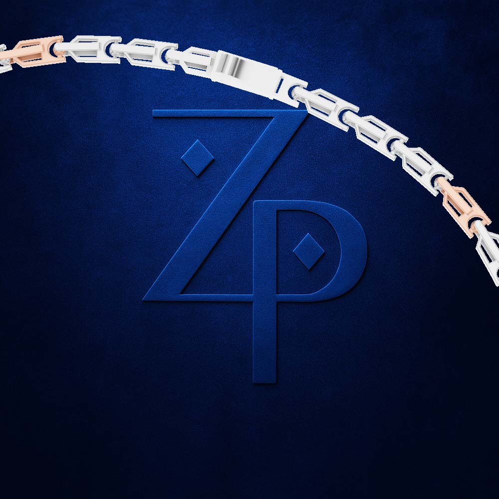 A close-up of a jewelry clasp and chain segment on a dark blue textured background, with a large embossed stylized 'ZP' logo behind it. The chain is silver-toned with rose-gold-toned accents.
