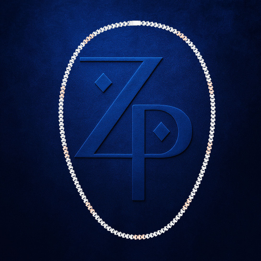 A diamond chain necklace arranged in an oval shape around a large embossed 'ZP' monogram on a textured dark blue background.