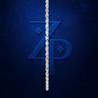 A silver-toned chain necklace is draped vertically down the center of a textured dark blue background, partially obscuring a large embossed stylized 'ZP' logo. The chain has small warm metallic links near the top where it enters the frame.