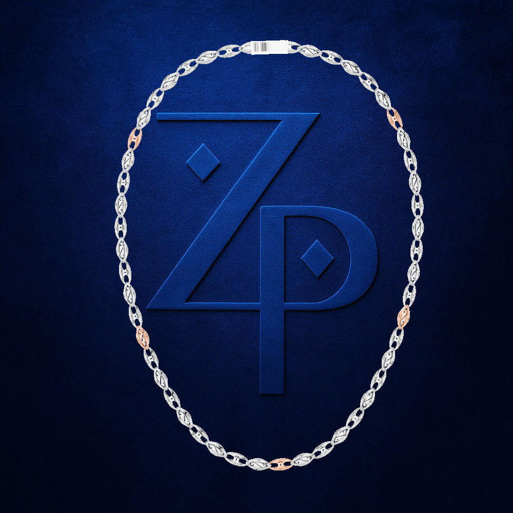 A silver-toned twisted rope chain necklace with small rose gold accents, arranged in an oval shape against a dark blue textured background with a large embossed 'ZP' logo.