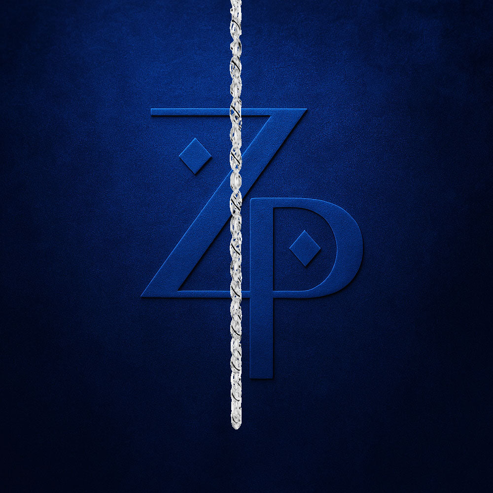 A close-up of a dark blue textured surface featuring a stylized interlocking 'Z' and 'P' monogram, with a silver twisted rope hanging vertically down the center.