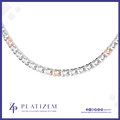 A silver-toned curb link chain necklace with alternating rose gold oval links, displayed against a white background with the Platizem brand logo at the bottom.