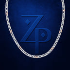 A silver-toned chain necklace with small rose gold accent links, arranged in an oval shape against a textured dark blue background. A large embossed 'ZP' monogram is visible in the center.