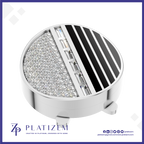 A round silver-toned jewelry setting or ring base with a split design: one half encrusted with clear stones and the other half featuring black diagonal stripes, shown on a white background with the Platizem brand logo at the bottom.