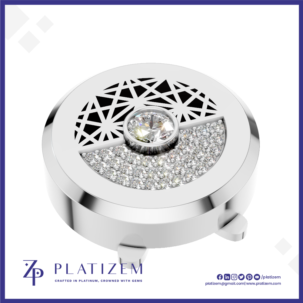 A round silver-toned jewelry box lid with a geometric cutout pattern on top, a central clear gemstone, and a semi-circular section of clear pavé stones. The brand name PLATIZEM is visible at the bottom.
