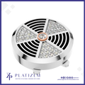 A round silver-toned jewelry setting or decorative piece with a circular center and five triangular sections set with clear gemstones, shown on a white background with the brand name PLATIZEM at the bottom.