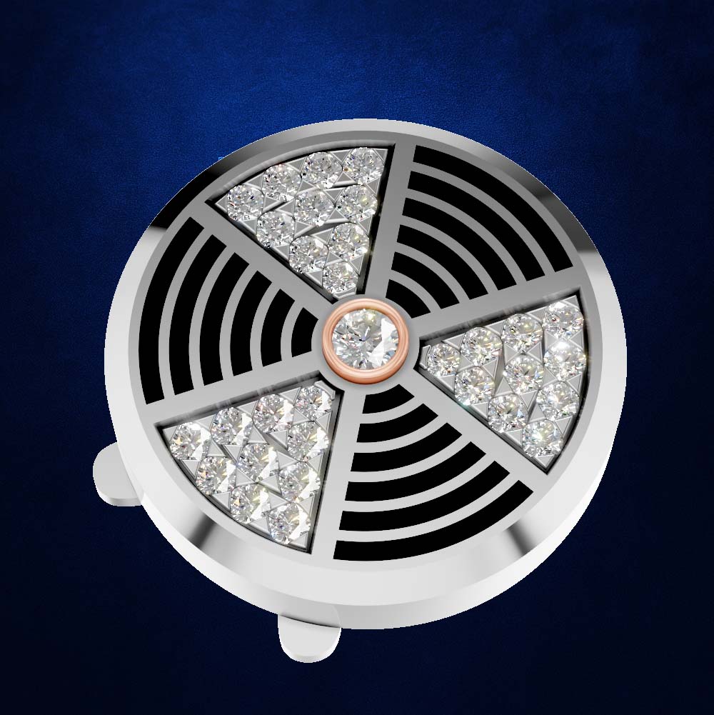 A round silver-toned jewelry box lid or decorative cover featuring a black concentric fan-like grille and four triangular crystal sections around the center, set against a dark blue background.