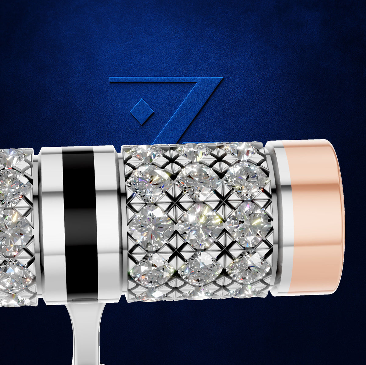 A close-up of a luxury cylindrical watch or accessory featuring a silver-toned bezel, a central cluster of clear pavé-set round diamonds, a black vertical stripe, and a rose gold-toned end cap, set against a textured dark blue background with a stylized blue '7' logo.