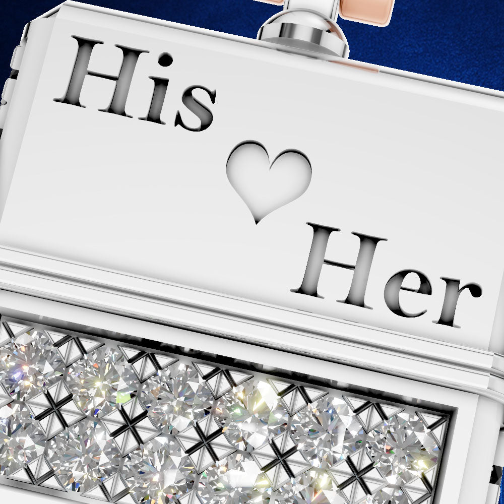 A close-up of a white rectangular jewelry box engraved with the words 'His' and 'Her' separated by a heart symbol, with a row of clear gemstones along the bottom edge.