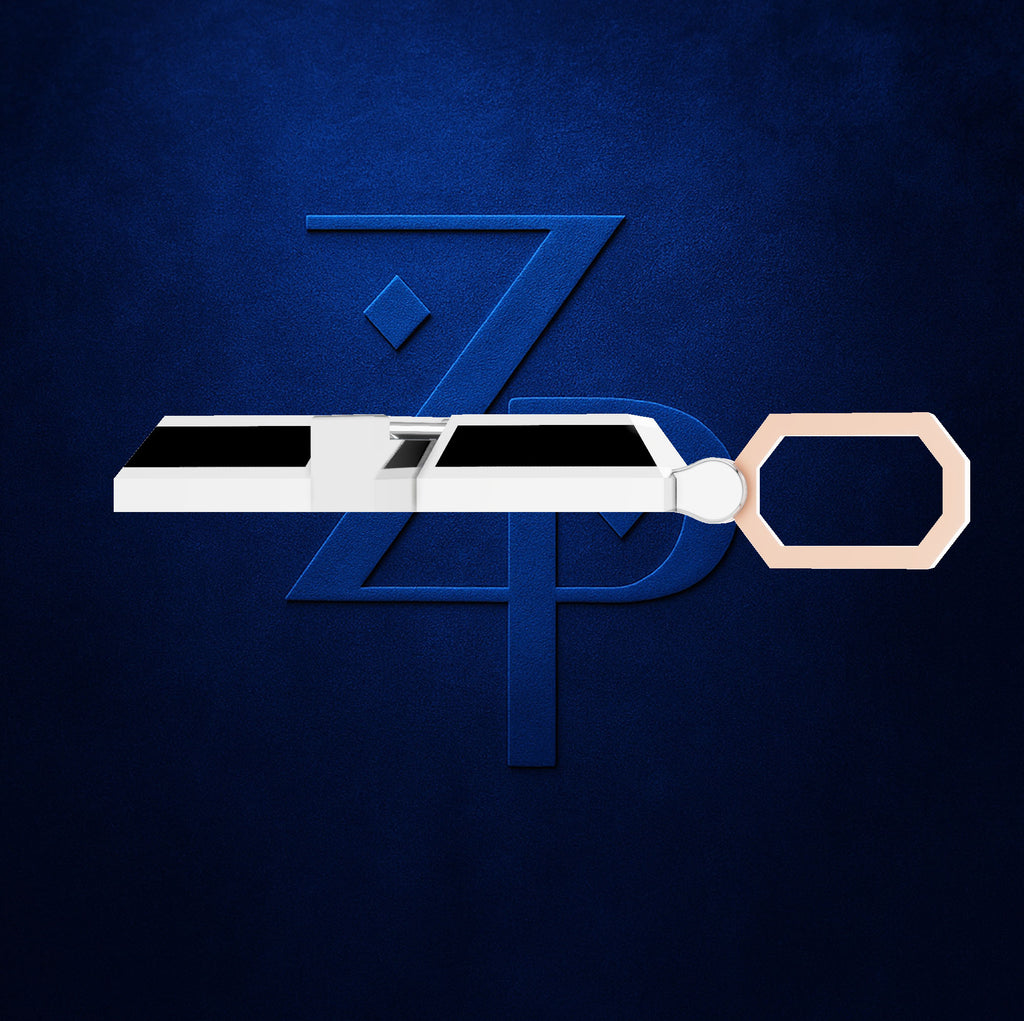 A modern keychain fob featuring a white and black train design with a rose gold keyring, set against a dark blue textured background with a stylized blue 'ZPD' logo.