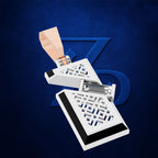A 3D-rendered jewelry product on a textured dark blue background. The item appears to be a white and silver geometric pendant or keychain-style accessory with a peach-colored loop and a black accent edge, shown floating with a stylized blue 'Z' shape behind it.