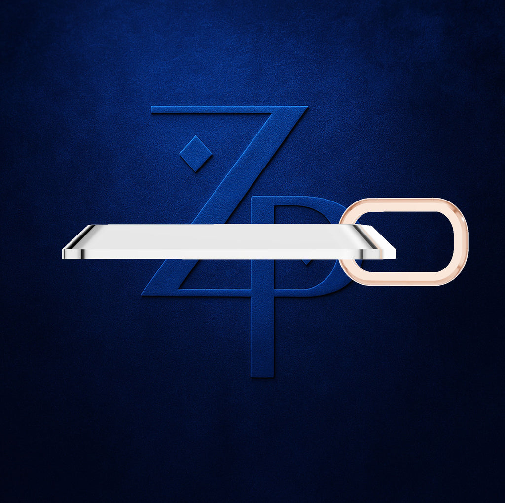 A modern, minimalist horizontal shelf with a white rectangular body and a rose gold oval ring, shown against a dark textured blue background with a stylized 'ZPD' logo.