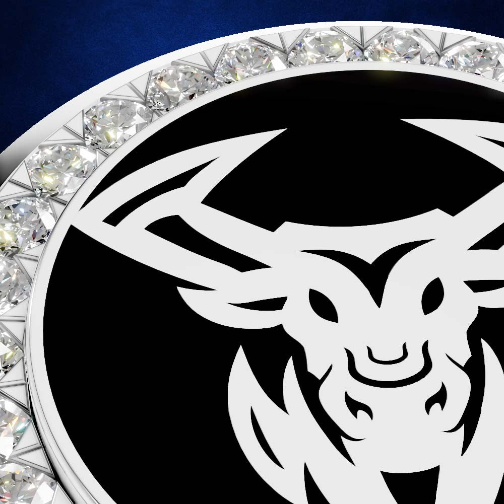 A close-up of a circular black and white emblem featuring a stylized horned animal head, bordered by a ring of clear faceted crystals on a dark blue background.