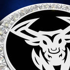 A close-up of a circular black and white emblem featuring a stylized horned animal head, bordered by a ring of clear faceted crystals on a dark blue background.