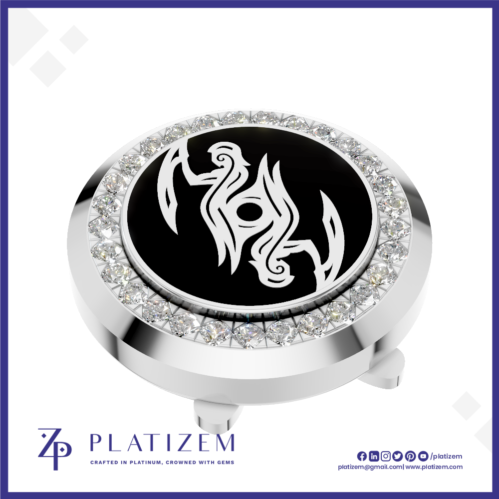 A round silver-toned golf ball marker cap featuring a black center with a white stylized bird emblem, surrounded by a halo of clear crystals. The brand name 'PLATIZEM' is visible at the bottom of the image.