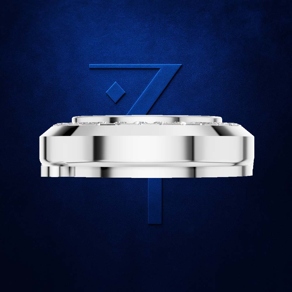 A polished silver-toned circular watch case or bracelet component shown floating against a deep textured blue background, with a large blue stylized '7' behind it.