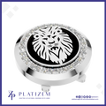 A round silver-toned golf club headcover featuring a black center with a white lion head emblem, surrounded by a halo of clear crystals. The brand name 'PLATIZEM' is visible at the bottom of the image.