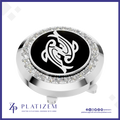 A round golf flagstick cap featuring a polished silver-tone bezel set with clear crystals, a black center disc with a white stylized animal emblem, and a threaded base. The brand name PLATIZEM is visible at the bottom of the image.
